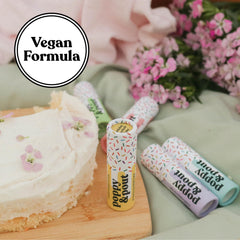 Poppy & Pout arranged as party favors showing gift-ready festive packaging