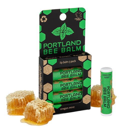Portland Bee Balm front packaging showing three tubes and branding benefit: simple natural care