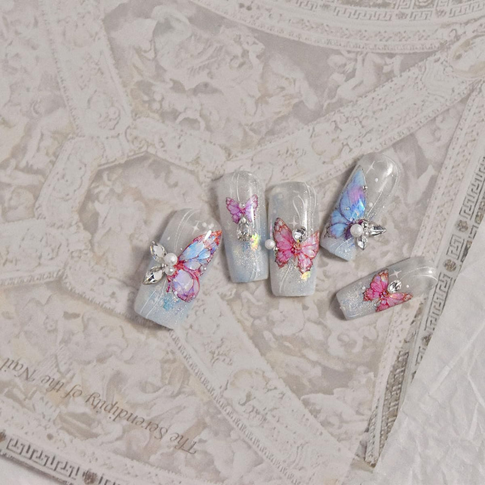 POWPOP lifestyle photo of summer manicure showcasing bright butterflies and style