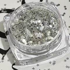 POWPOP star shapes close-up showing multiple sizes and reflective finish for dimension