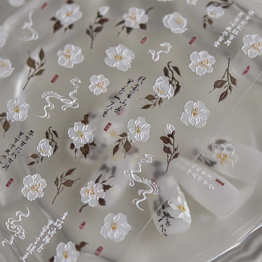 POWPOP stickers applied on French tips to add elegant floral accents