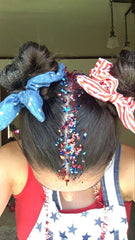 Prehot glitter applied at hair roots to add patriotic color and stage presence