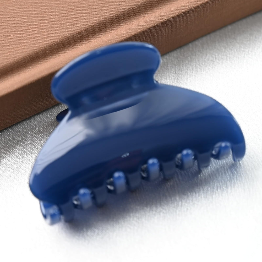 Prettyou dark blue worn in hair demonstrating secure hold and style