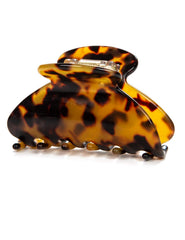 Prettyou front view of tortoise shell clip showing glossy finish and refined shape