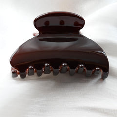 Prettyou side profile showing teeth and spring, ensures secure grip and comfort