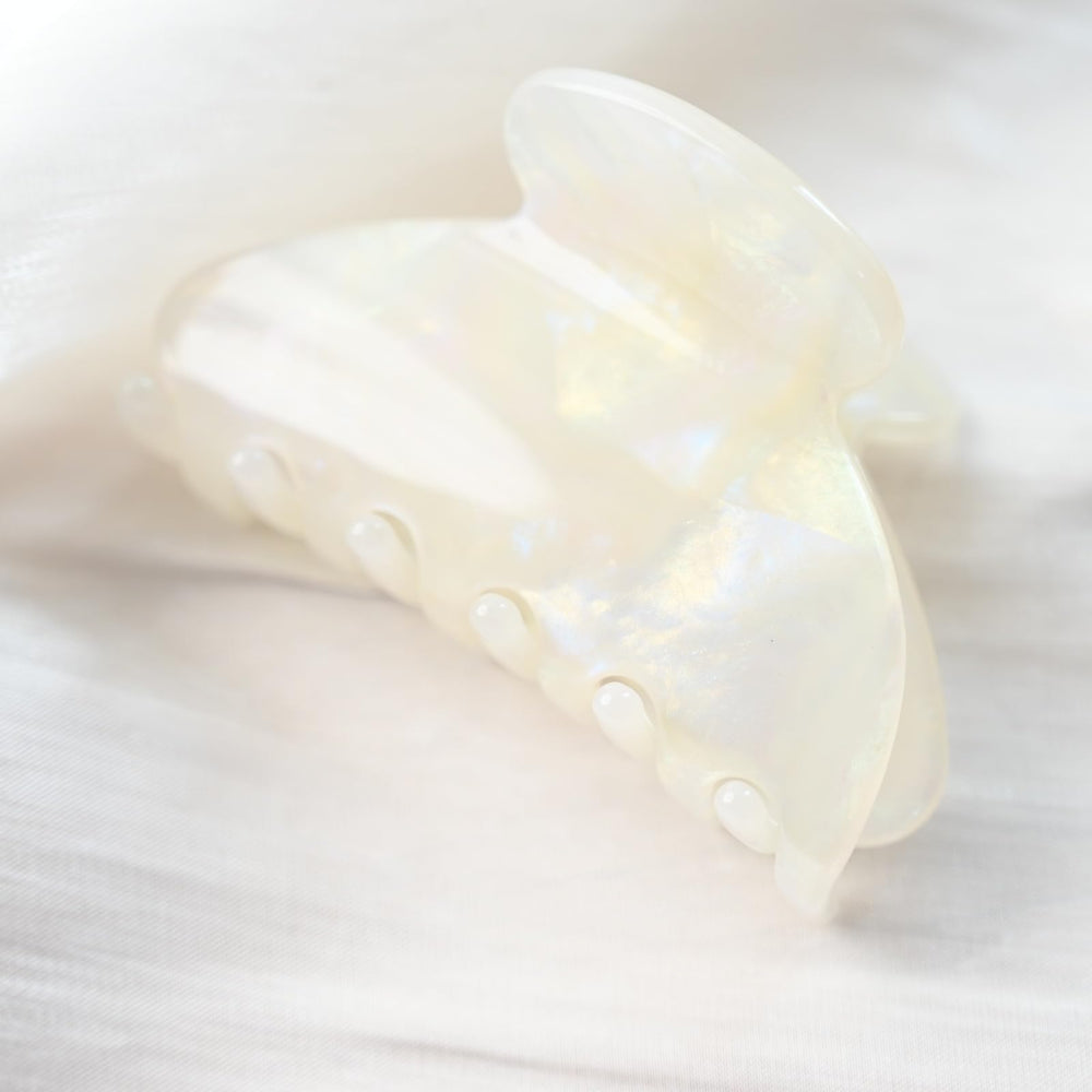 Prettyou side profile showing claw teeth detail for firm, comfortable grip