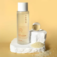 PRETTYSKIN bottle held in hand to demonstrate true 250ml scale and convenience