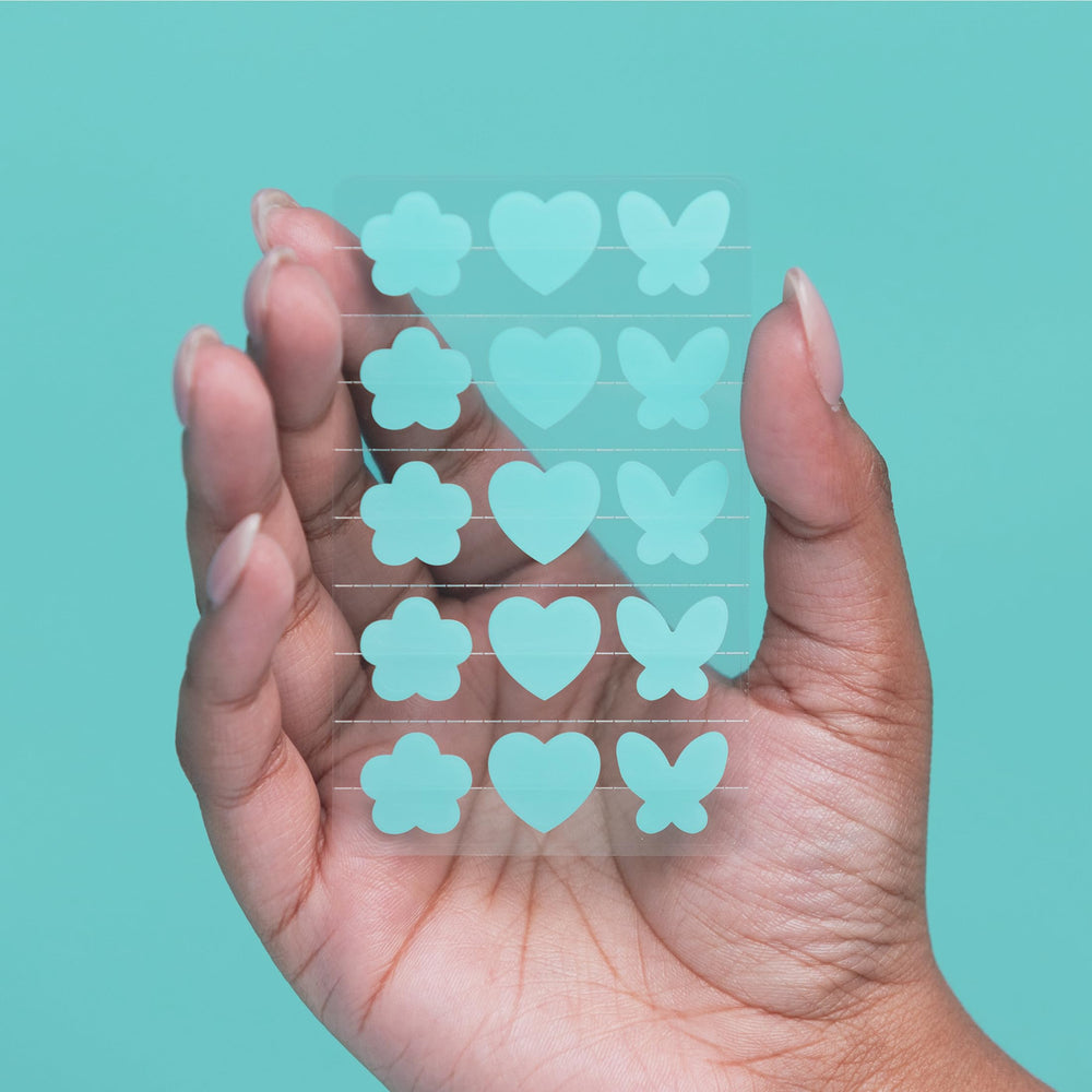Proactiv patch being pressed onto blemish highlighting secure adhesion and protection benefit