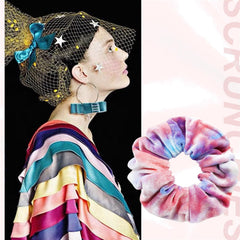 PROPOG scrunchie next to hand for size comparison showing 4.3-inch scale