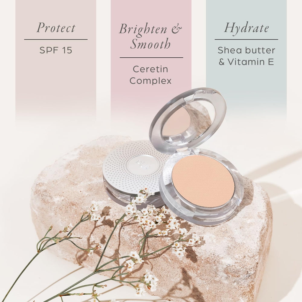 PÜR MINERALS compact in hand demonstrates travel-friendly size and convenience