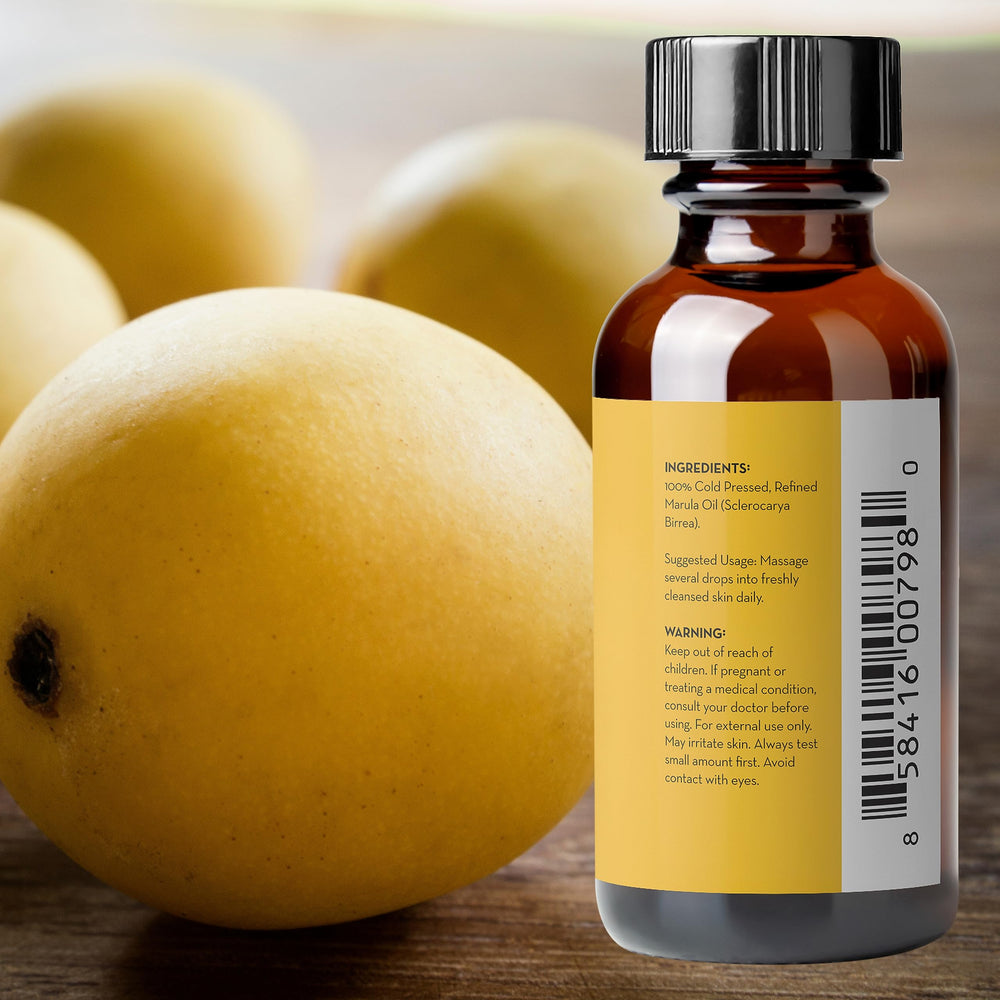 Pure Body Naturals marula oil smoothing hair ends for added shine