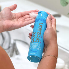 Pure Brazilian product label close-up highlighting keratin, silk, and coconut oil