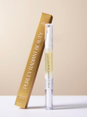 Purely Radiant pen beside coin to show portable 3ml size and travel convenience