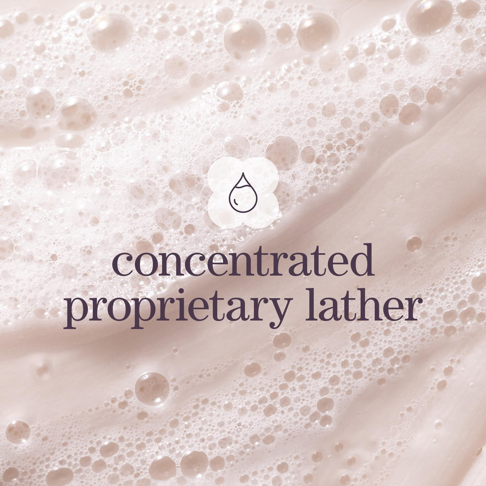 Pureology Hydrate Sheer shampoo in shower demonstrating gentle cleansing in use