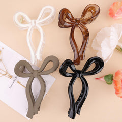 PWEOUKE bow hair clip front view showing polished finish and elegant shape benefit hold