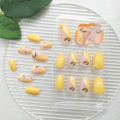PXUEZAY close-up of lemon nail art highlighting vibrant detail