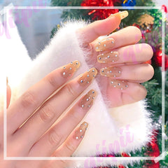 qiipii nails decorated with tiny resin gems showing professional-looking accents