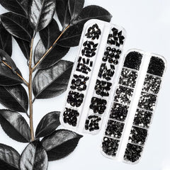 qiipii rhinestones applied on manicure showcasing dramatic black accents for eye-catching nails