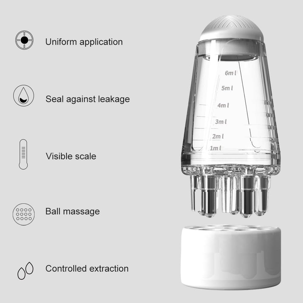 Qirvaten applicator being used on scalp to evenly distribute oil and stimulate circulation