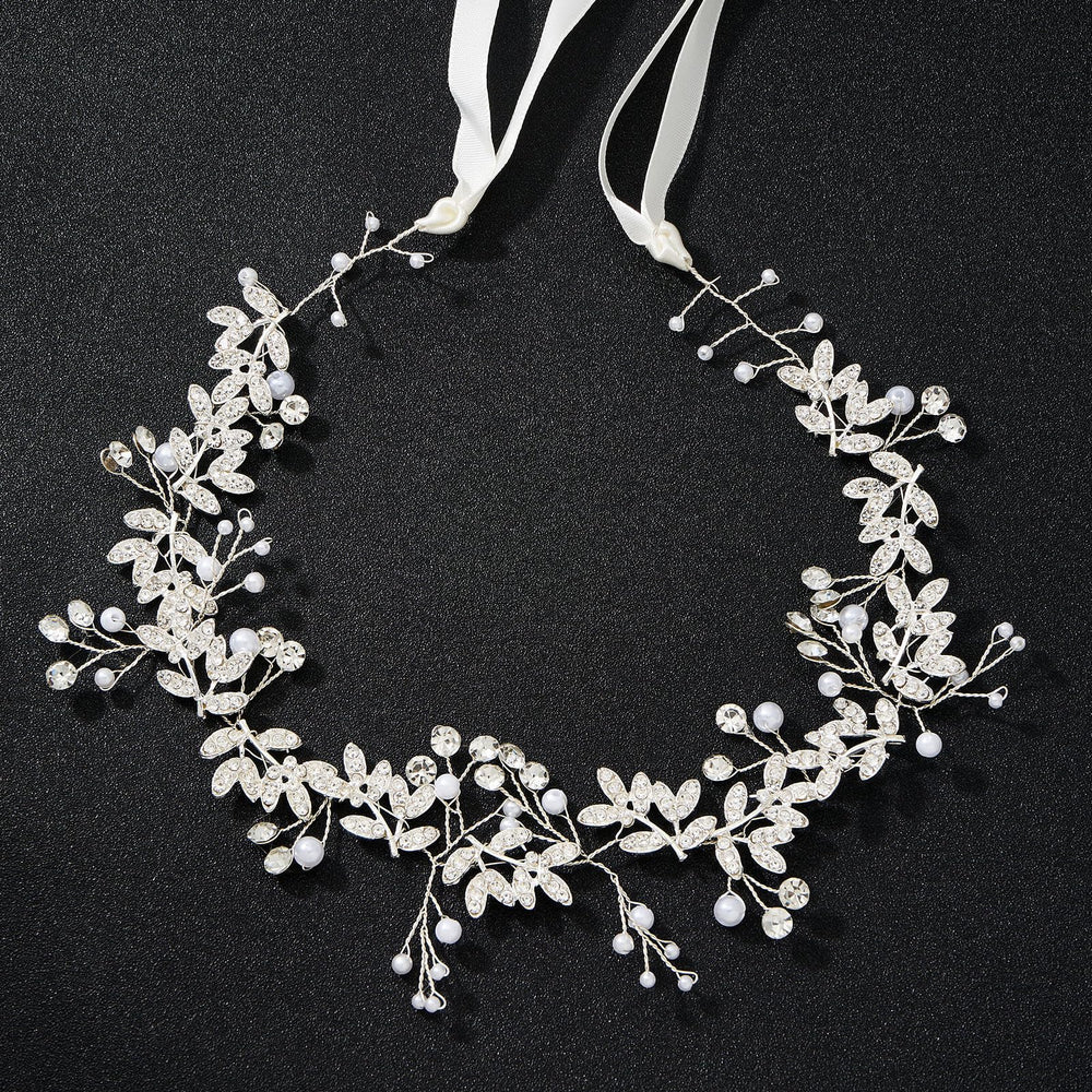 QIUTIMIY close-up of pearls and crystals highlighting handmade detail