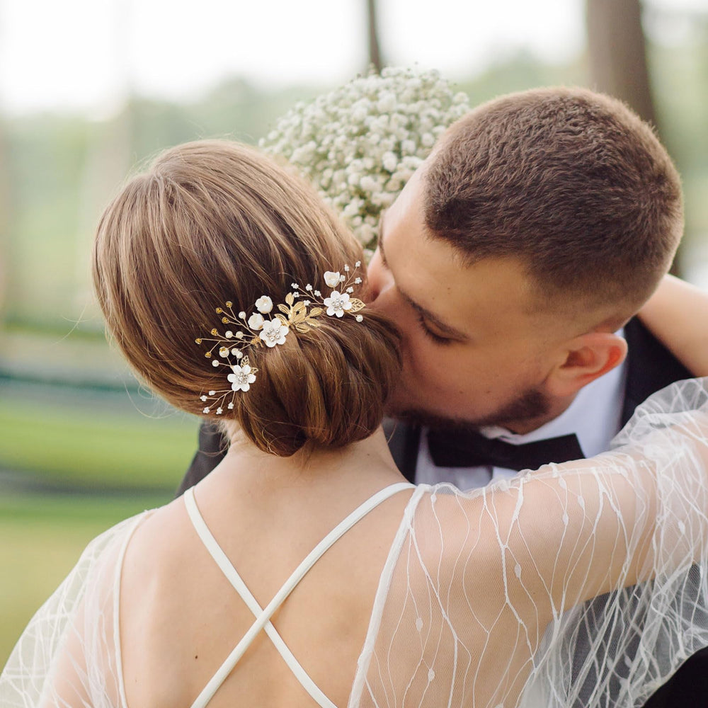 QIUTIMIY combs inserted in a bridal updo, shows secure hold and decorative effect