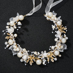 QIUTIMIY close-up of pearls and crystals highlighting handcrafted detail