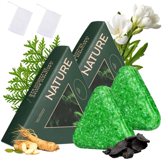 QnmtShna front packaging showing two triangle shampoo bars and foaming net, eco travel benefit
