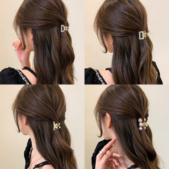 Qojai clip securing half-up hairstyle demonstrating secure, decorative hold