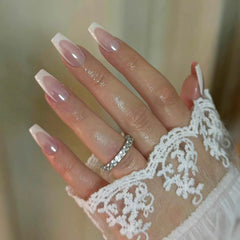 Qsnidy coffin nails in hand demonstrating natural fit and polished look