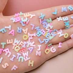 Quezadyl letters placed on a manicured nail tip showing application and custom style benefit