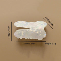 QUNITKAST claw holding a half-up style offering non-slip everyday styling