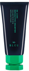 R+Co BLEU De Luxe mini front bottle showing travel‑friendly benefit