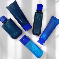 R+Co BLEU lifestyle image near ocean props evoking BLEU Waves citrus floral scent