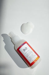 R+Co Hot Spell creamy balm texture transforming to smooth cream for easy styling