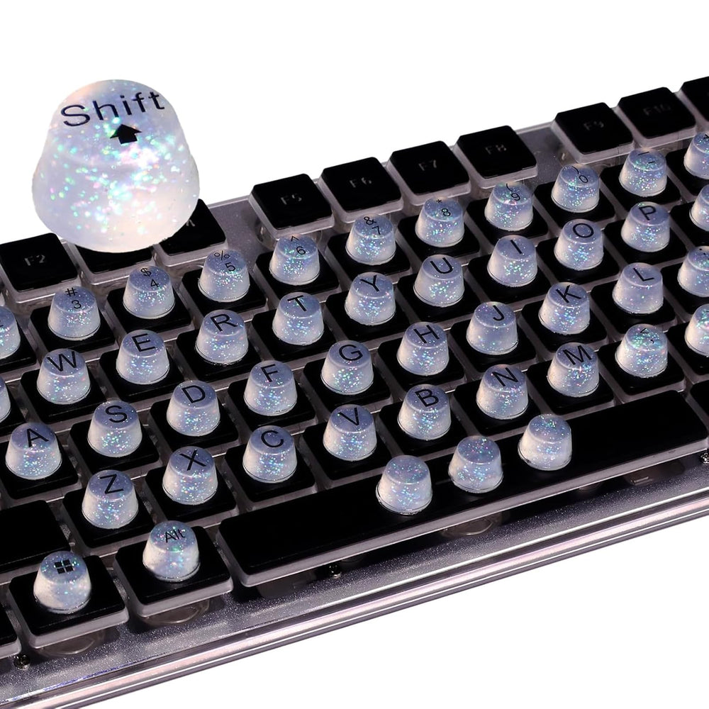 Raised Button front packaging showing 64 clear glitter keycaps and benefits