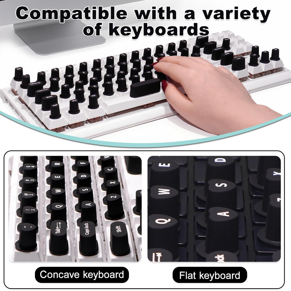 Raisetip keycap layout on a black keyboard, clear laser-printed letters visible