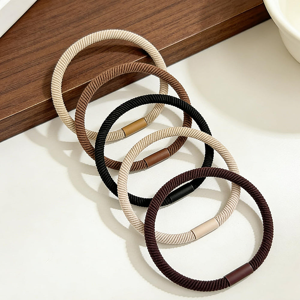 Random Mood hair ties beside ruler for size comparison, compact and travel-friendly