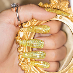 RARJSM gel polish texture on fingertip showing dense glitter payoff