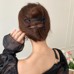 ravlzors in hair side profile showing secure French twist hold