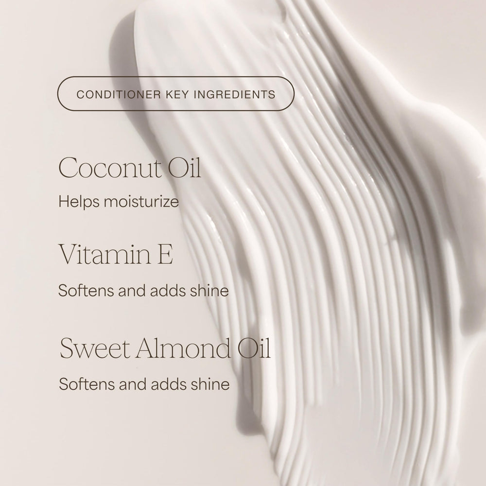 RAW SUGAR applying conditioner in shower demonstrating smoother styling