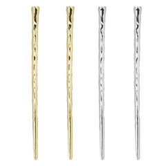 RAYNAG front view showing four gold hair sticks for reliable hold