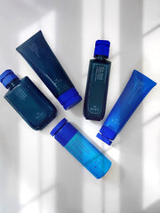 R+Co BLEU being applied to wet hair, showing ease of use and instant conditioning benefit