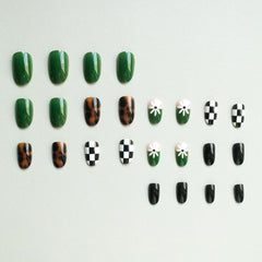 Rdntbeu flat lay of mixed floral, checkered and tortoiseshell nails illustrating pattern variety