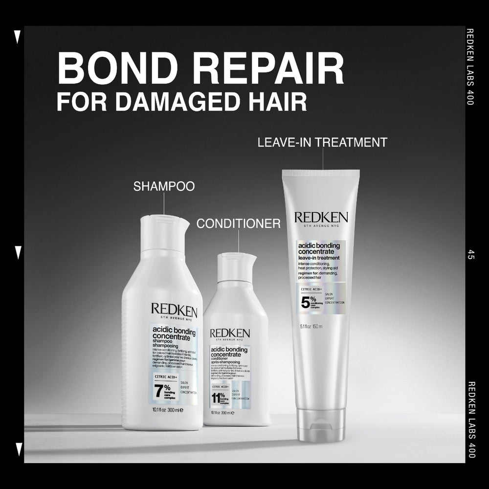 Redken bottle staged on bathroom shelf for salon-quality daily routine