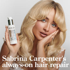 Redken bottle on nightstand suggesting overnight repair and calming scent