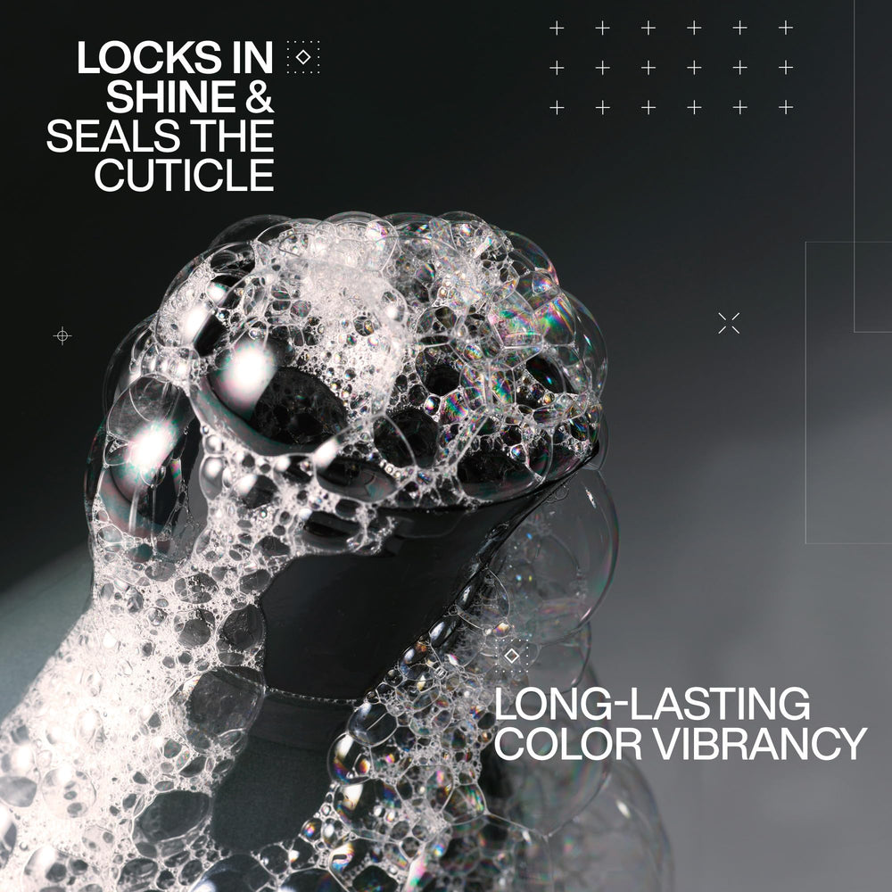 Redken close-up texture on pump highlighting creamy sulfate-free lather