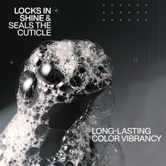 Redken close-up texture on pump highlighting creamy sulfate-free lather