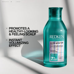 Redken bottle paired with conditioner illustrating system use benefit