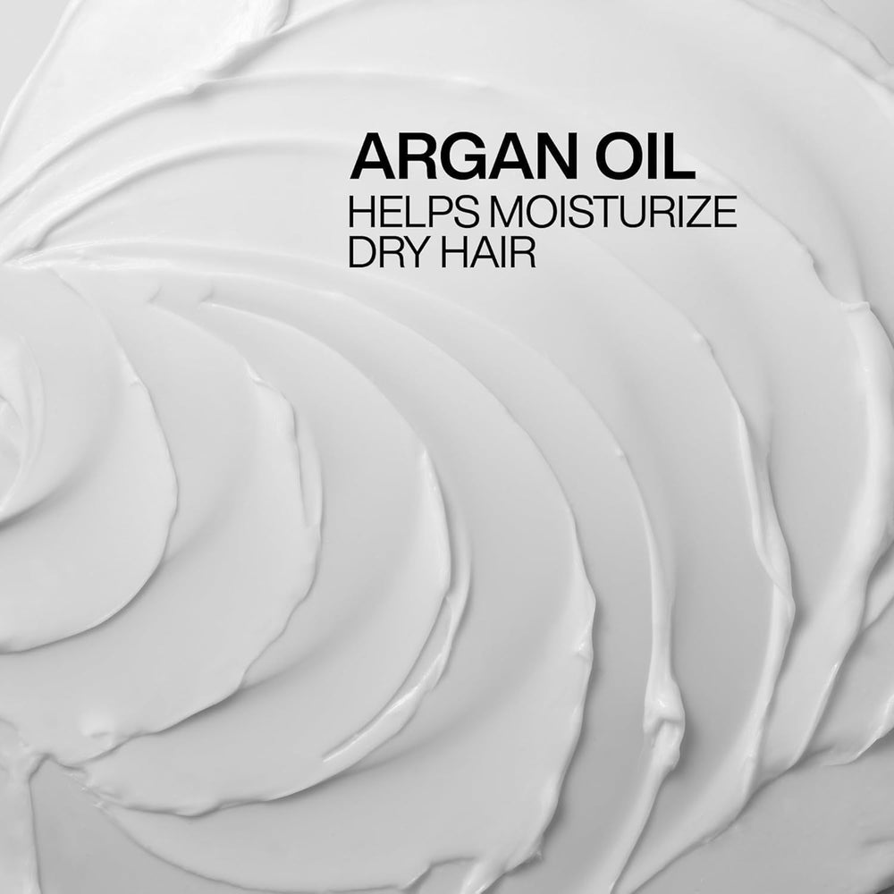 Hair after Redken treatment showing glossy, smoothed strands and visibly softer hair