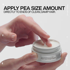 Redken balm dispensed on palm showing recommended small amount
